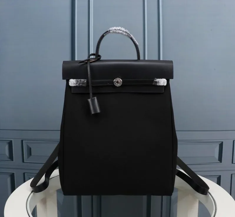 Hermes Buckle Lock Shape Striped Black, Silver Toned Hardware Bag