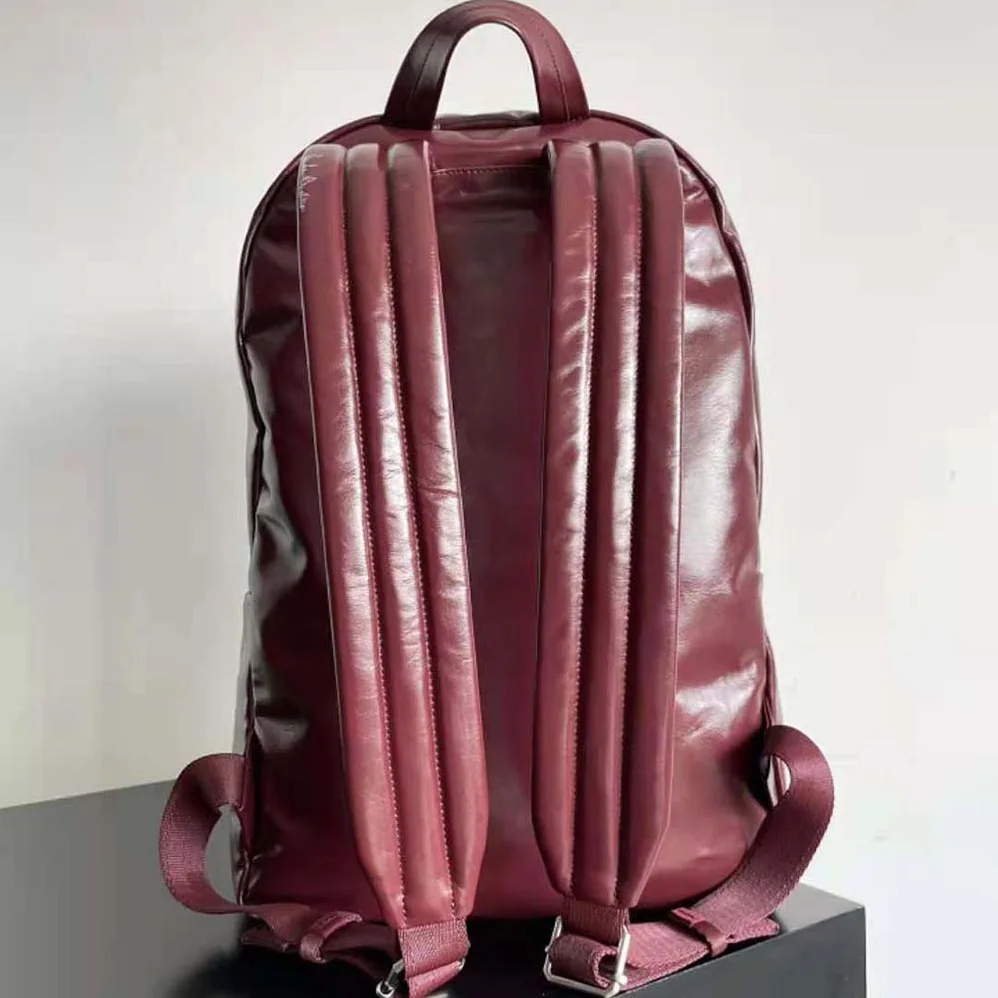 Bottega Veneta Medium Archetype Backpack Crafted from Supple Lambskin Leather for Men in Maroon