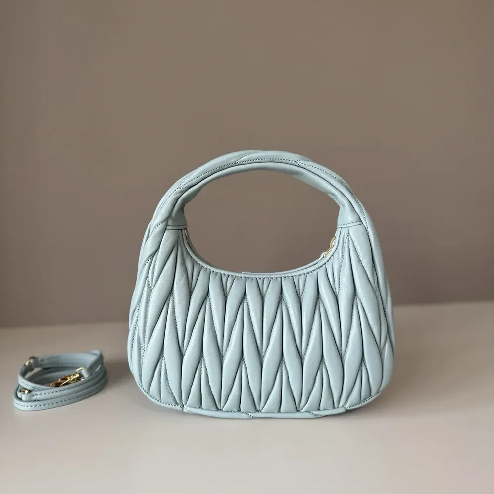Miu Miu Wander Matelassé Nappa Leather Hobo Bag for Women in Powder Blue Miu Miu Wander Matelassé Nappa Leather Hobo Bag for Women in Powder Blue