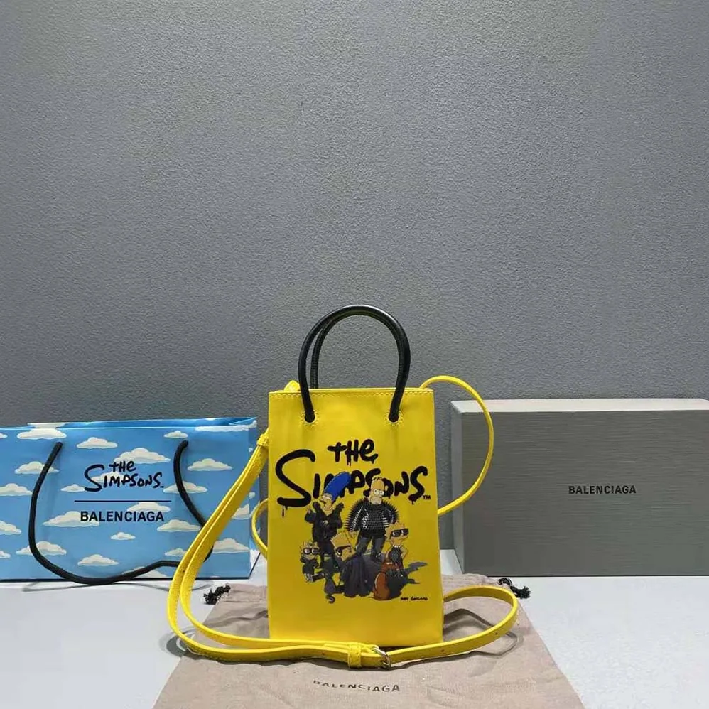 Balenciaga the Simpsons Tm 20th Television Mini Shopping Bag in Shiny Box Calfskin in Yellow for Women Balenciaga the Simpsons Tm 20th Television Mini Shopping Bag in Shiny Box Calfskin in Yellow for Women