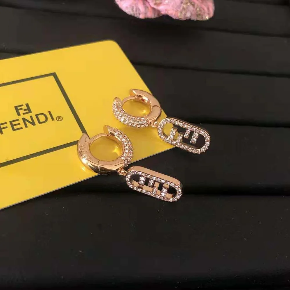 Fendi O Lock Earrings Gold-Colored Earrings in Bronze and Zircon for Women Fendi O Lock Earrings Gold-Colored Earrings in Bronze and Zircon for Women