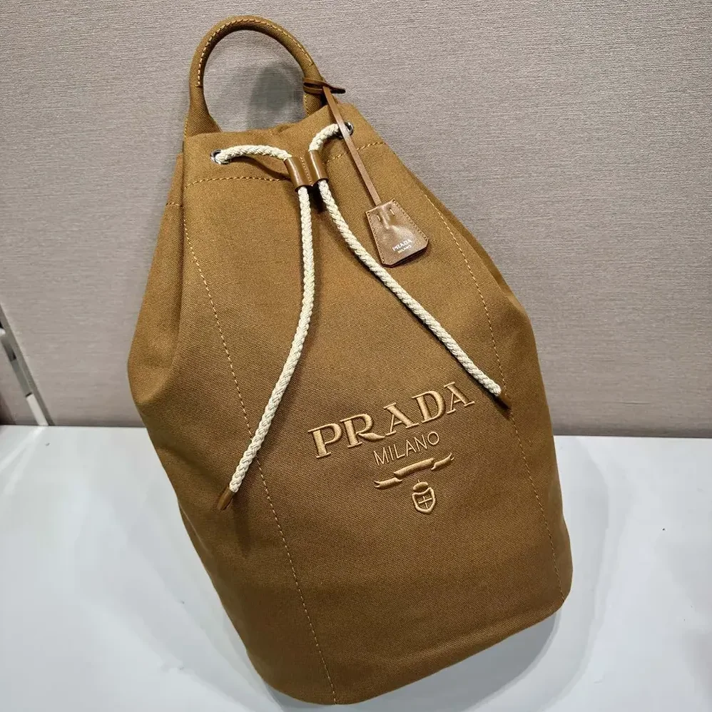 Prada Canvas Drawstring Duffle Bag for Unisex in Brown