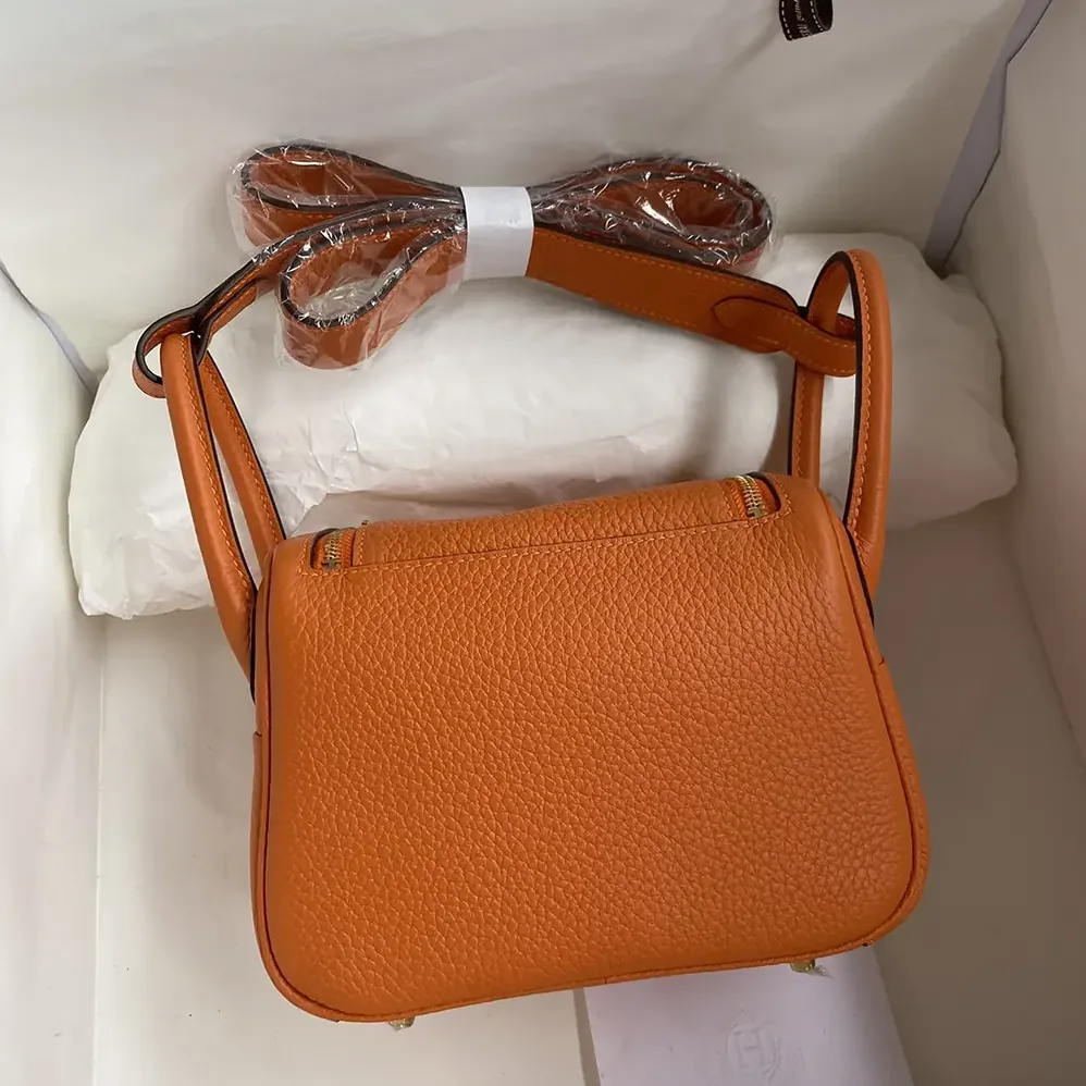 Hermes Lindy Mini 19 in Clemence Leather for Women in Orange/Gold Hermes Lindy Mini 19 in Clemence Leather for Women in Orange/Gold