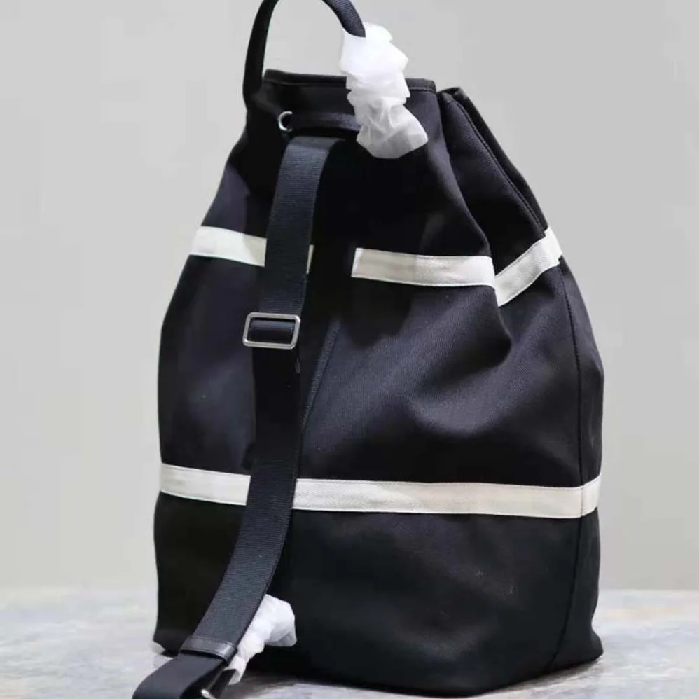 Saint Laurent YSL Rive Gauche Sling Bag in Canvas for Men in Black