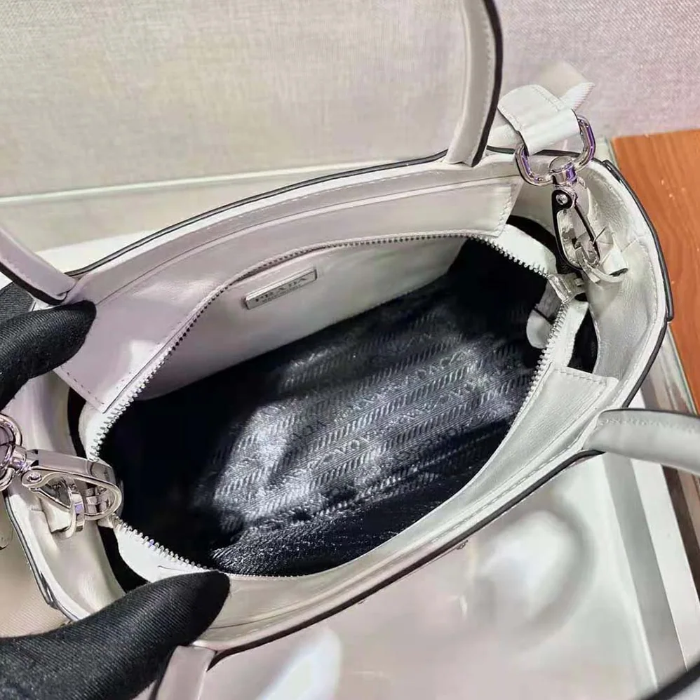 Prada Brushed Leather Handbag Nylon Lining for Women in White