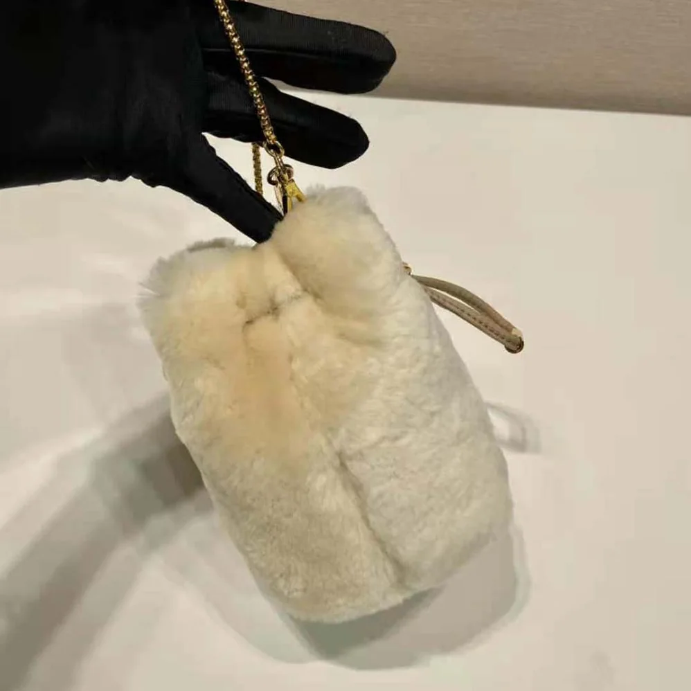 Prada Shearling Mini-pouch for Women in Beige