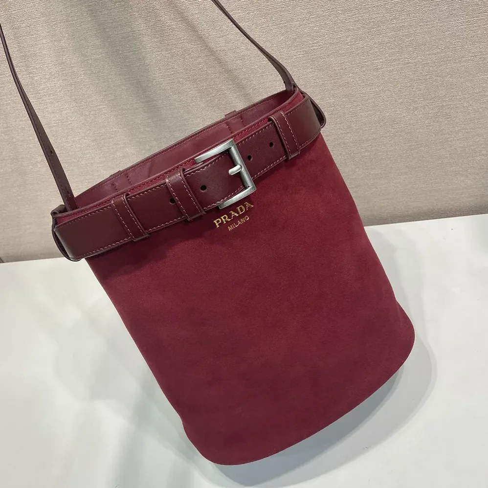 Prada Buckle Belted Suede Bucket Bag for Women in Burgundy Prada Buckle Belted Suede Bucket Bag for Women in Burgundy