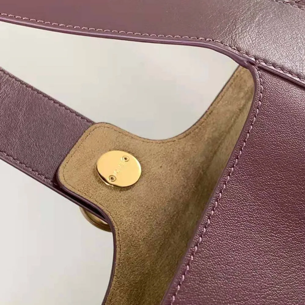 Loewe Mini Pebble Bucket Bag in Mellow Calfskin for Unisex in Maroon