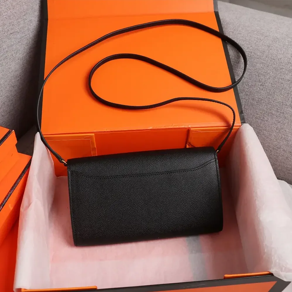 Hermes Constance Long To Go in Epsom Leather for Women in Black/Gold