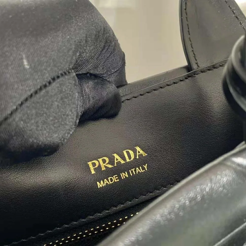 Prada Small Leather Prada Symbole Bag with Topstitching for Women