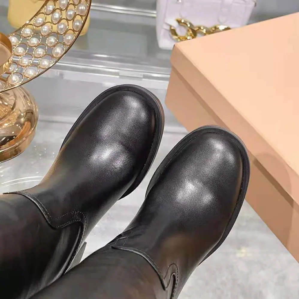 Miu Miu Leather Booties with Screen-printed Logo for Women in Black