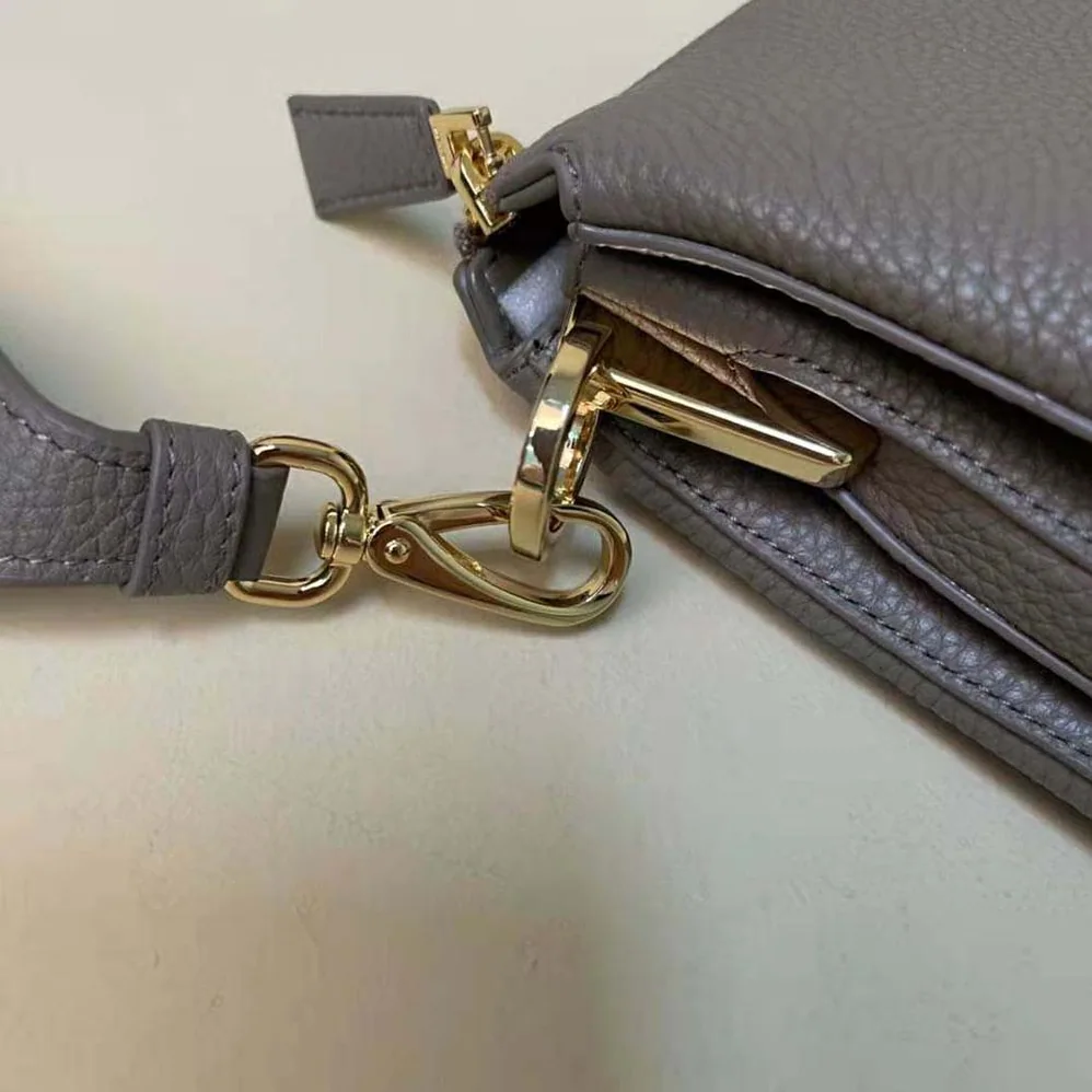 Prada Leather Shoulder Bag with Metal Lettering Logo for Women in Gray Prada Leather Shoulder Bag with Metal Lettering Logo for Women in Gray