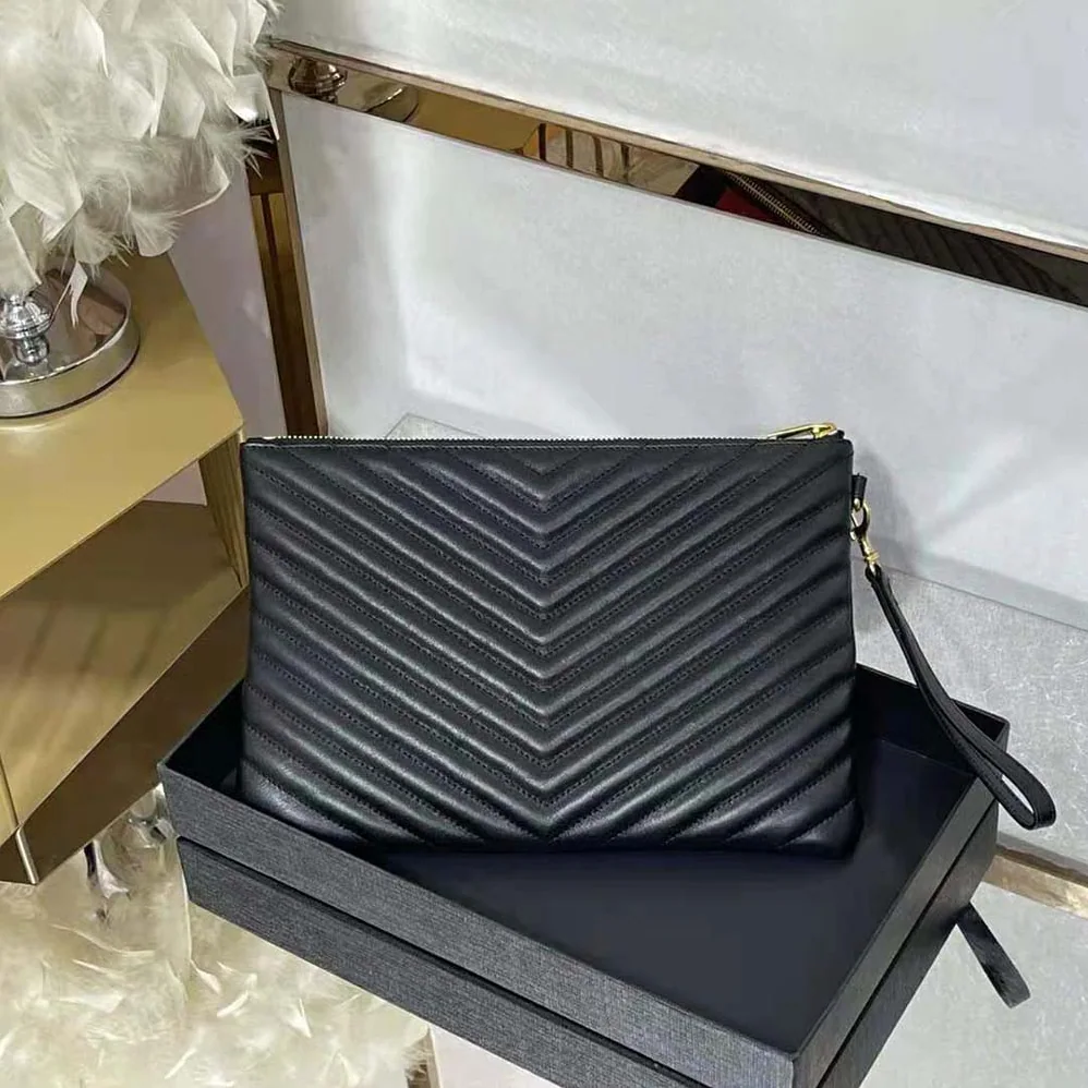 Saint Laurent YSL Monogram Tablet Pouch in Matelassé Leather for Women in Black Saint Laurent YSL Monogram Tablet Pouch in Matelassé Leather for Women in Black