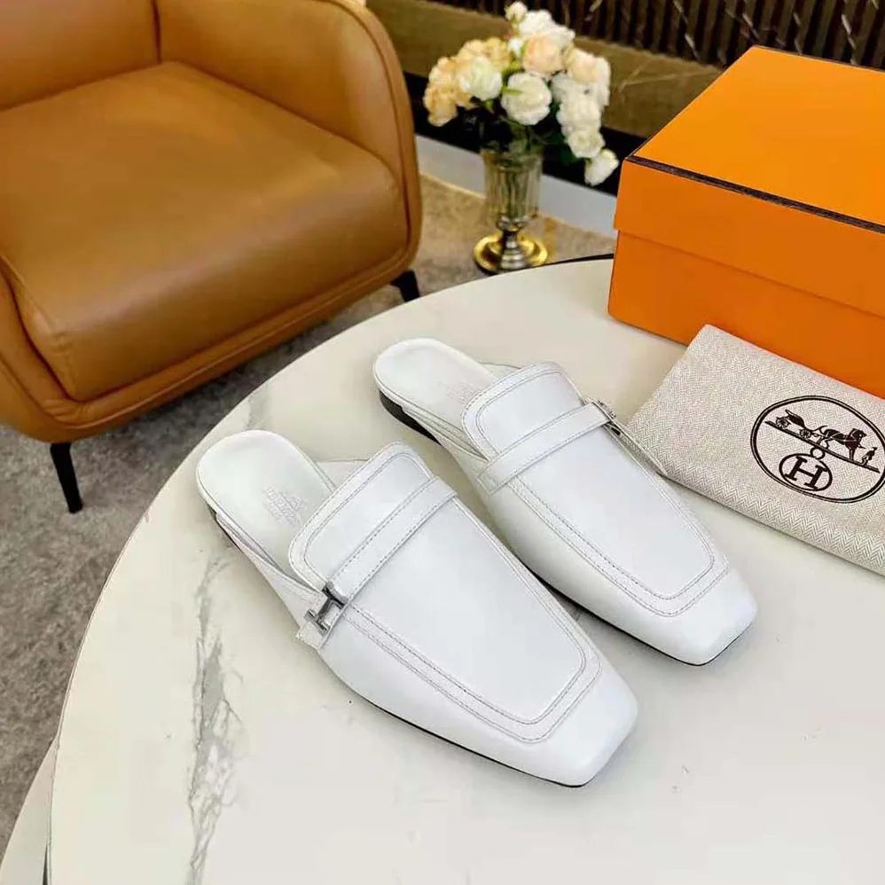 Hermes Groupie Mule in Goatskin with Miniature Palladium-Plated Paris Buckle for Women in White