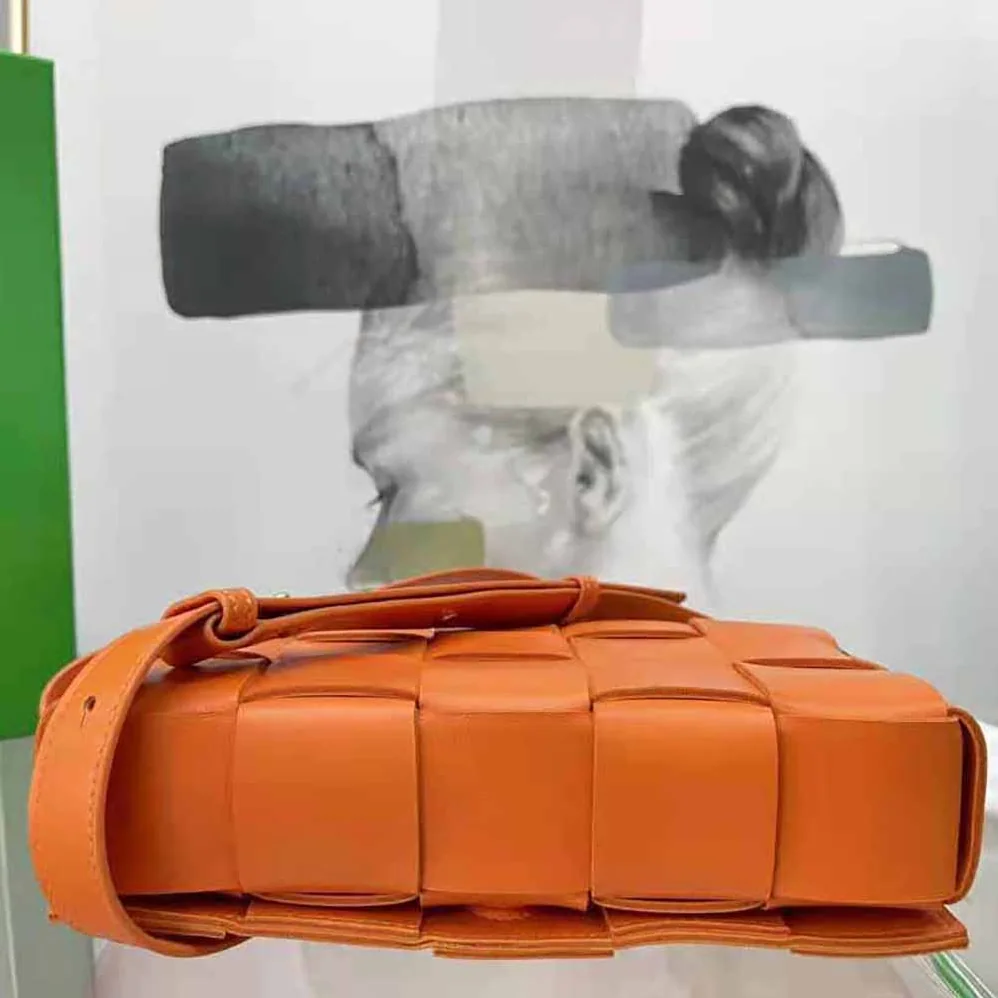 Bottega Veneta Cassette Intreccio Leather Cross-Body Bag for Women in Orange Bottega Veneta Cassette Intreccio Leather Cross-Body Bag for Women in Orange