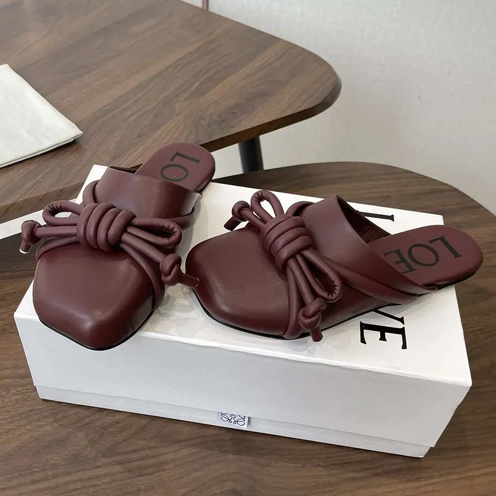 Loewe Flamenco Knot Mule in Lambskin for Women in Dark Chestnut Loewe Flamenco Knot Mule in Lambskin for Women in Dark Chestnut
