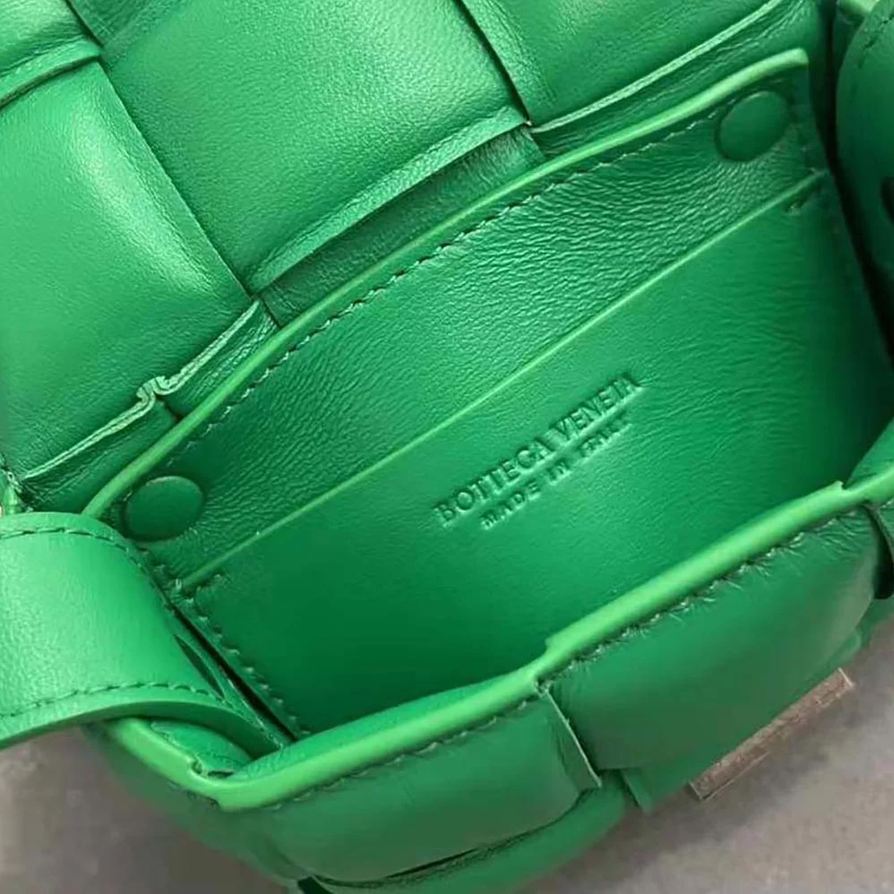 Bottega Veneta Candy Padded Cassette Mini Padded Intreccio Leather Cross-Body Bag for Women in Green Bottega Veneta Candy Padded Cassette Mini Padded Intreccio Leather Cross-Body Bag for Women in Green