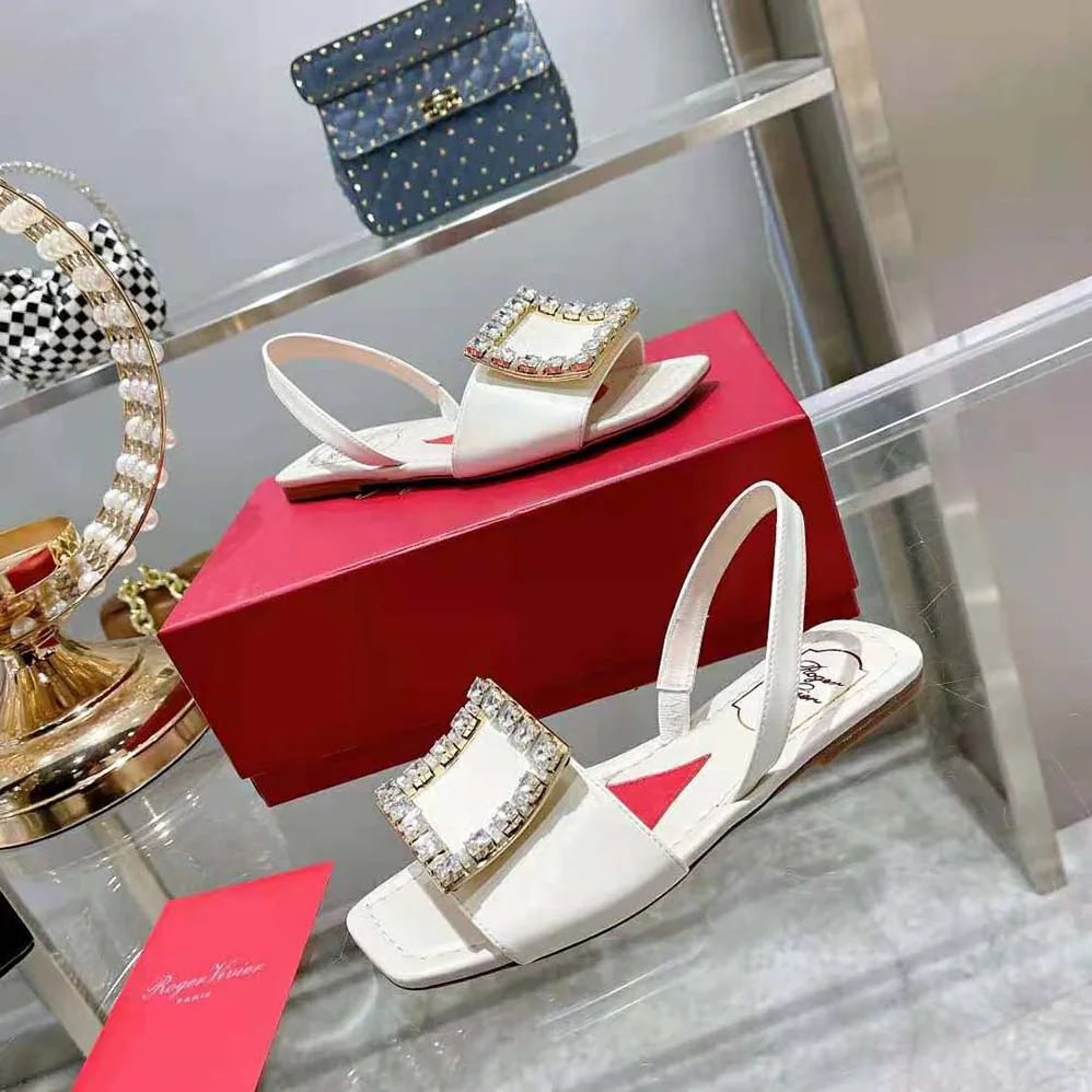 Roger Vivier Biki Love Strass Buckle Sandals in Leather for Women in White