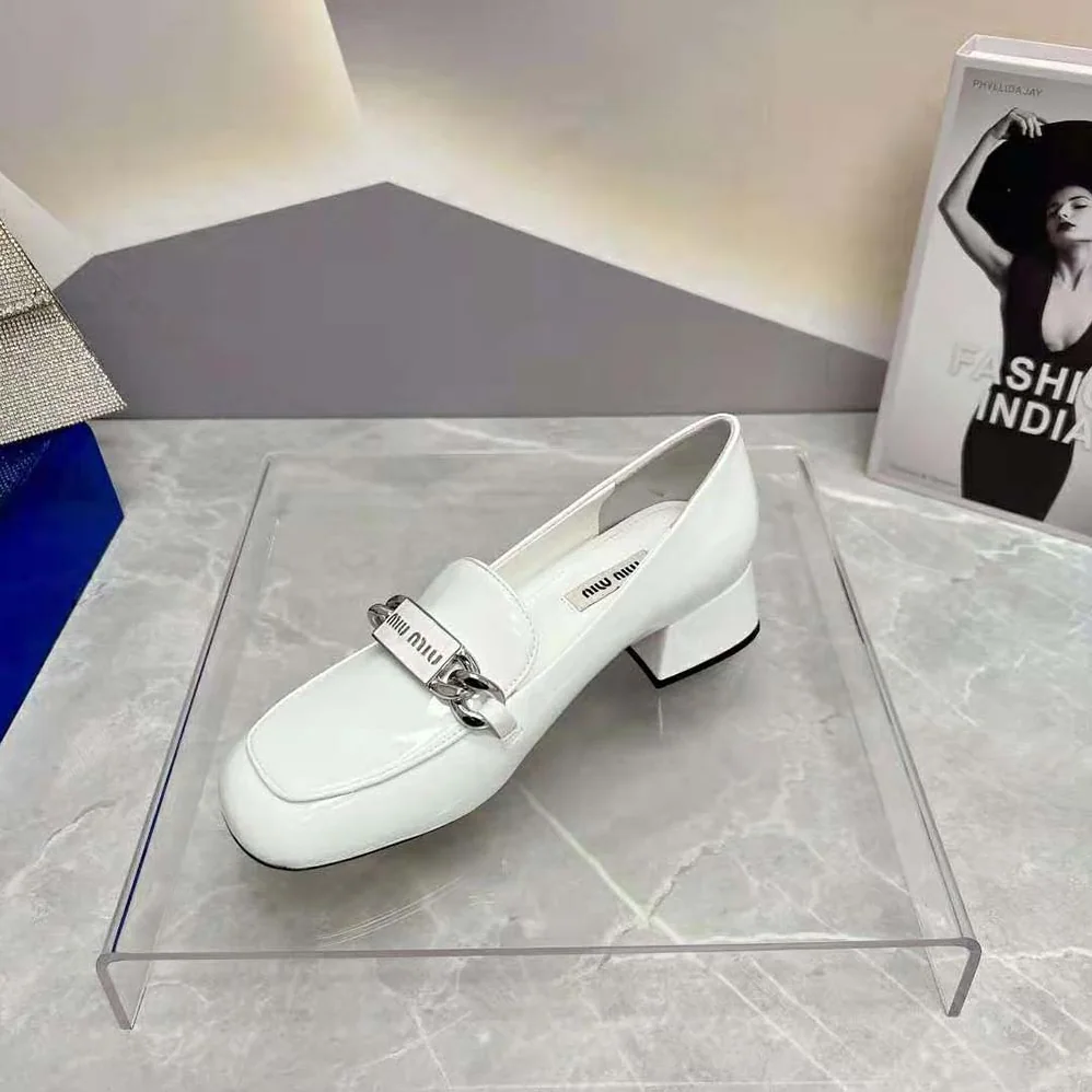 Miu Miu Patent Leather Loafers in 35 mm Heel Height for Women in White Miu Miu Patent Leather Loafers in 35 mm Heel Height for Women in White