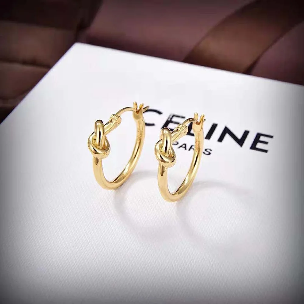 Celine Knot Small Hoops in Brass with Gold Finish for Women Celine Knot Small Hoops in Brass with Gold Finish for Women