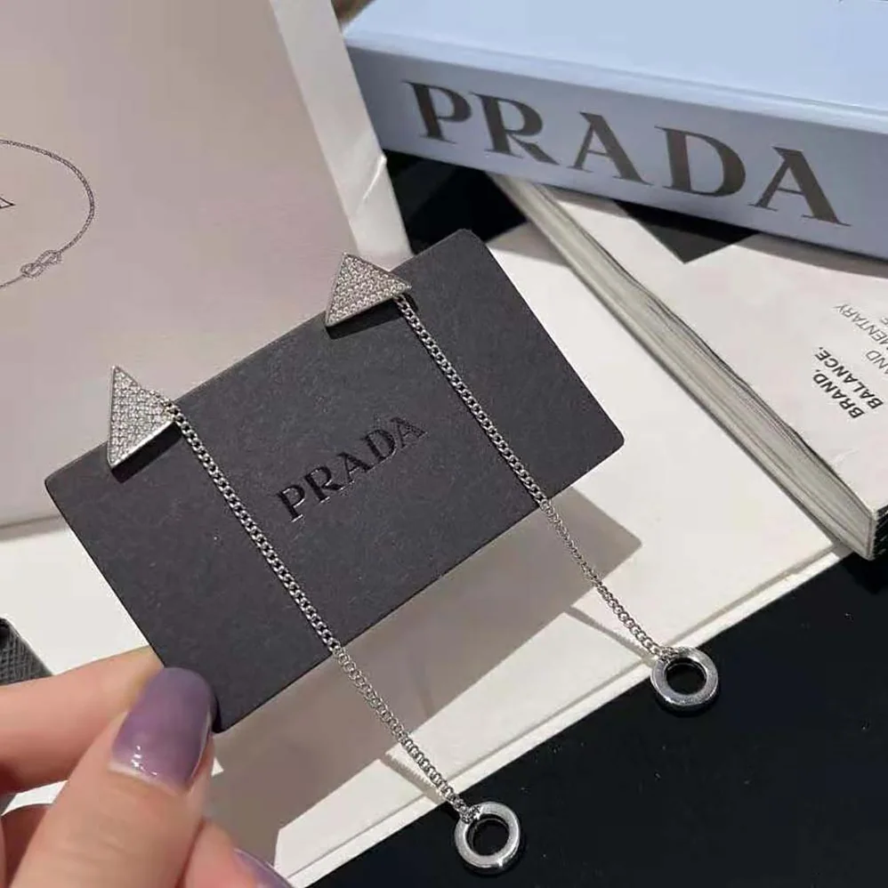 Prada Crystal Logo Jewels AirPods Pendant Earrings for Women Prada Crystal Logo Jewels AirPods Pendant Earrings for Women