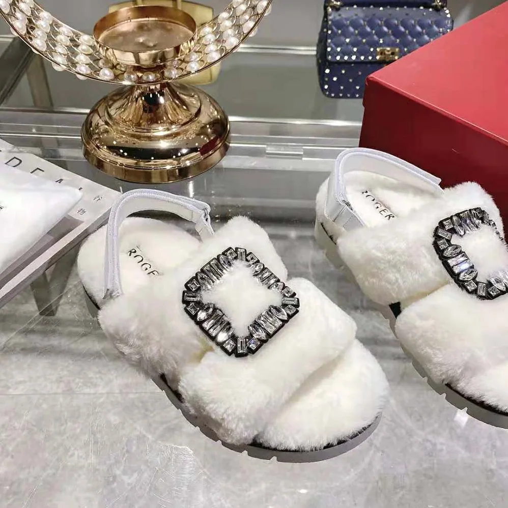 Roger Vivier Viv' Winter Fur Strass Buckle Sandals in Sheepskin for Women in White