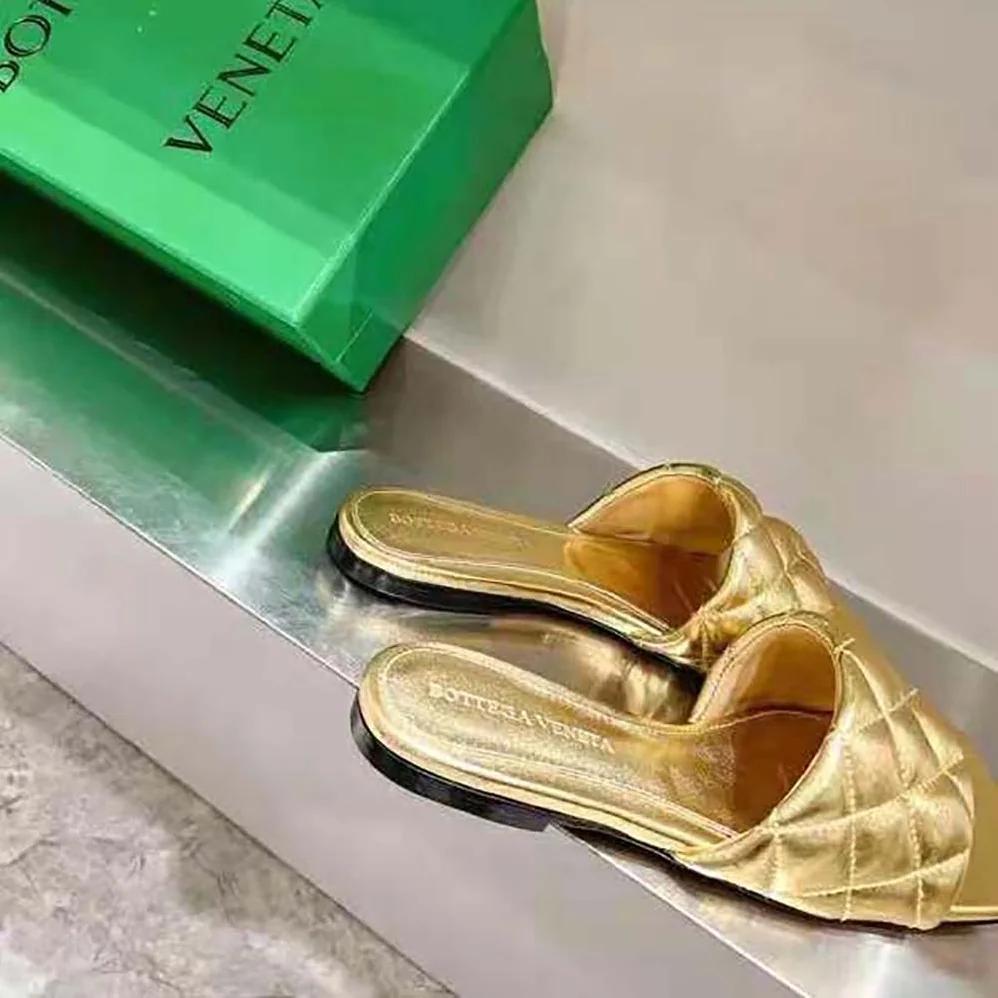 Bottega Veneta Lido Flat Sandal Intreccio Metallised Leather Flat Sandals for Women in Gold