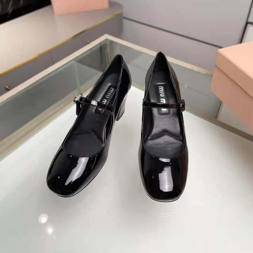 Miu Miu Patent Leather Pumps with Metal Lettering Logo for Women in Black Miu Miu Patent Leather Pumps with Metal Lettering Logo for Women in Black