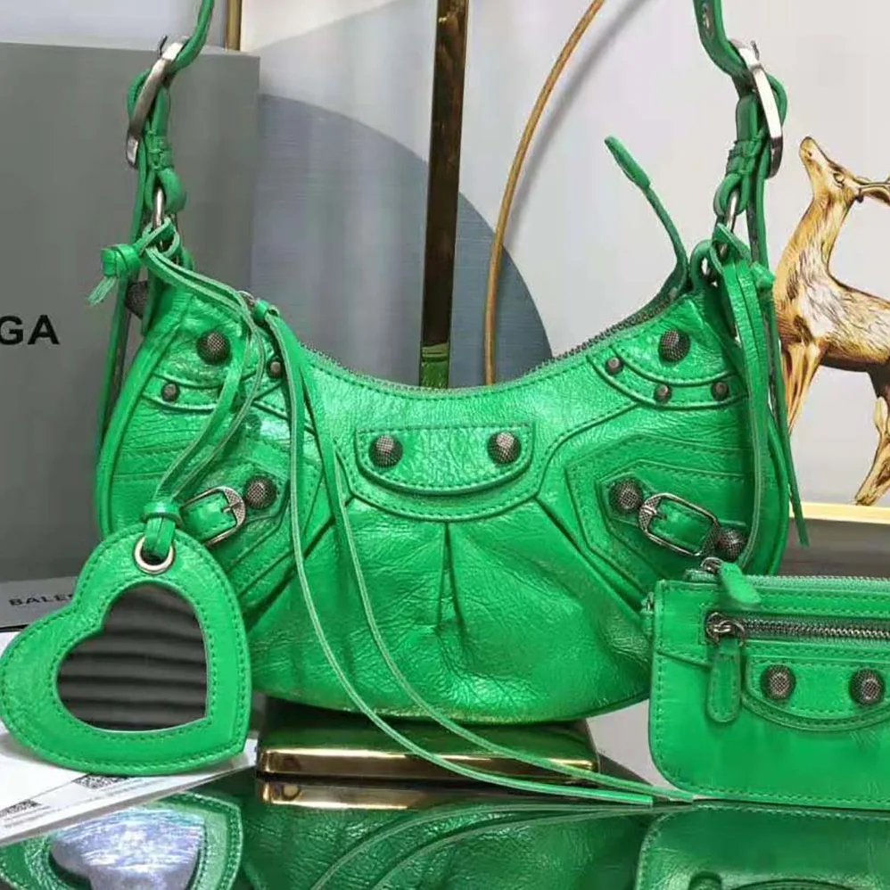 Balenciaga Le Cagole XS Shoulder Bag for Women in Green Balenciaga Le Cagole XS Shoulder Bag for Women in Green