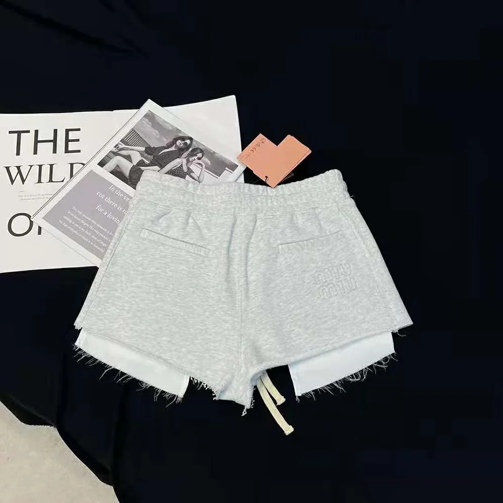 Miu Miu Embroidered Cotton Fleece Shorts for Women in Silver