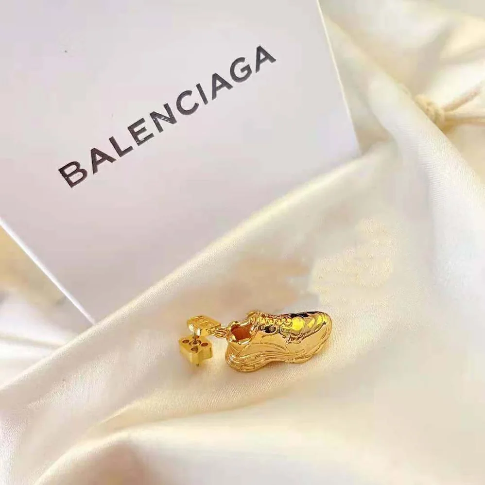Balenciaga Mini Triple S Earring in Gold Bronze and Brass for Women Balenciaga Mini Triple S Earring in Gold Bronze and Brass for Women