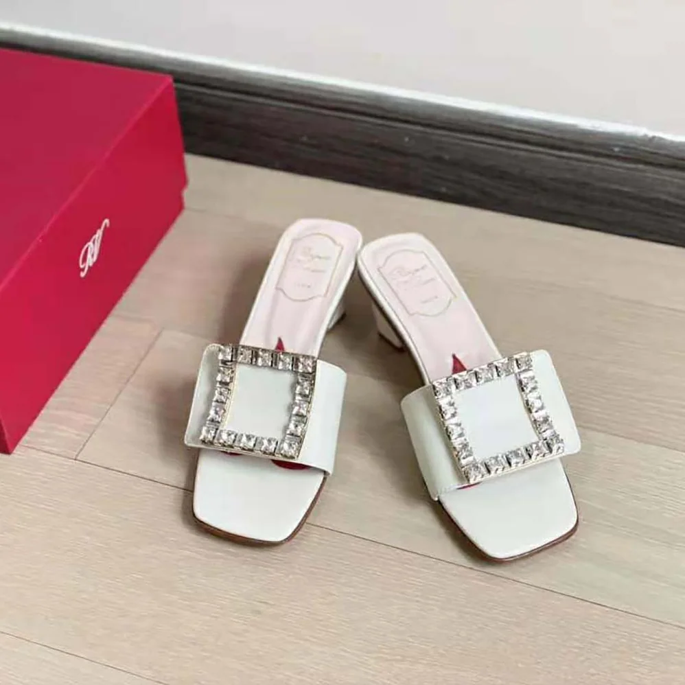 Roger Vivier Biki Love Strass Buckle Mules in Leather for Women in White Roger Vivier Biki Love Strass Buckle Mules in Leather for Women in White