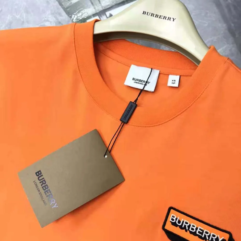 Burberry Logo Appliqué Cotton Oversized T-shirt for Women in Orange Burberry Logo Appliqué Cotton Oversized T-shirt for Women in Orange
