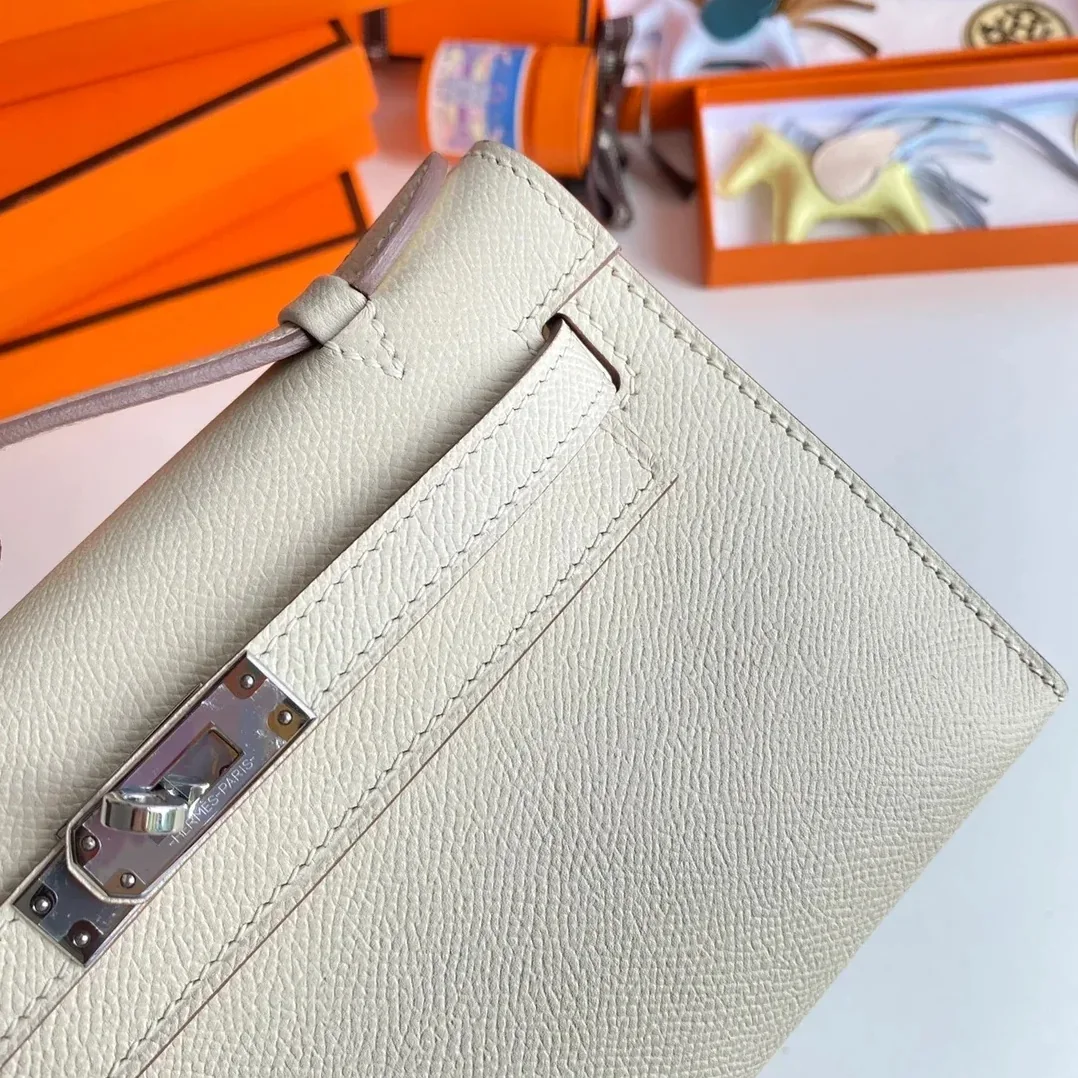 Hermes Kelly Pochette Top Handle Bag in Blanc Epsom Palladium Hardware