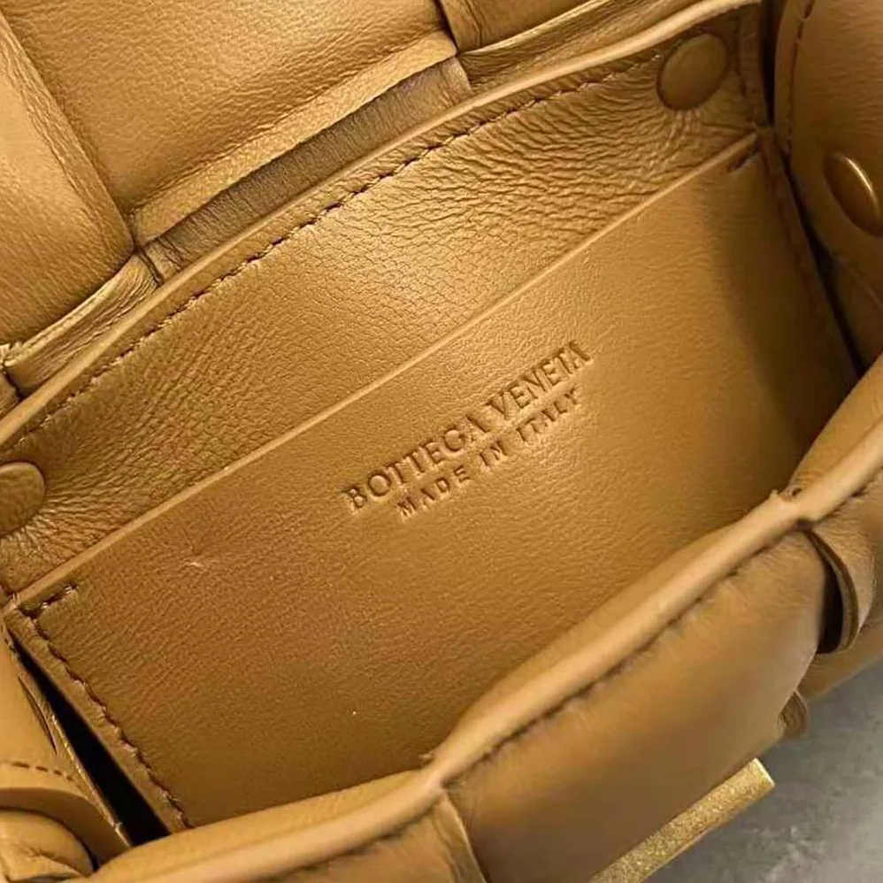Bottega Veneta Candy Padded Cassette Mini Padded Intreccio Leather Cross-Body Bag for Women in Brown