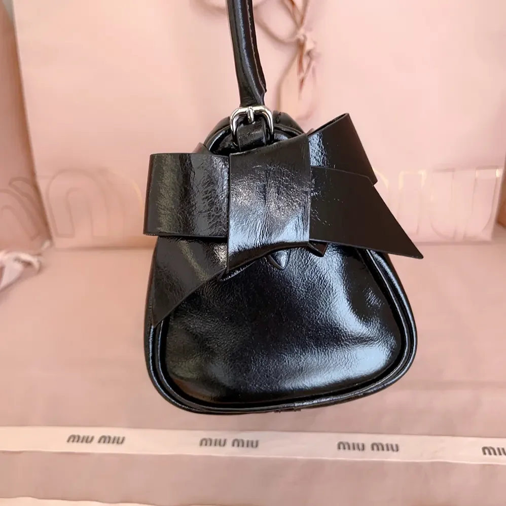 Miu Miu Shiny Leather Pouch for Women in Black Miu Miu Shiny Leather Pouch for Women in Black