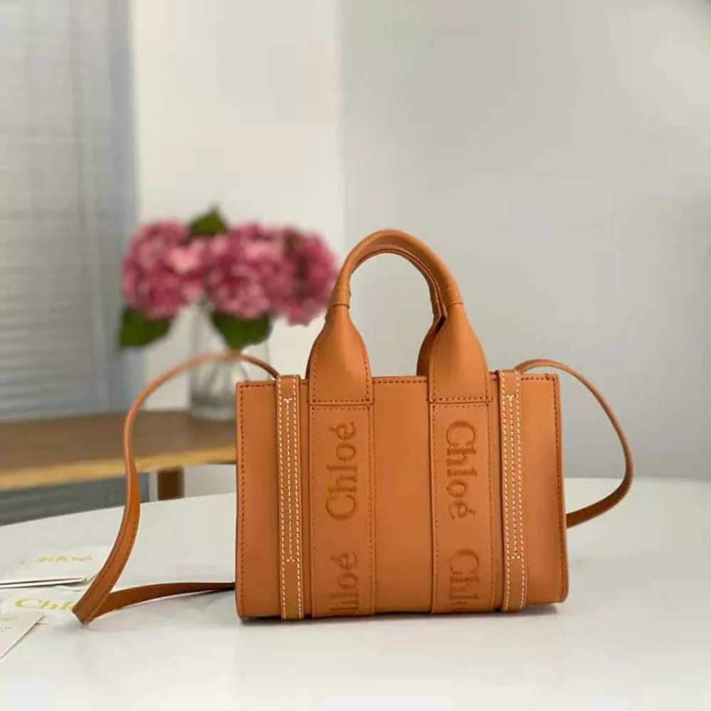 Chloe Mini Woody Tote Bag with Embroidered Chloé Logo for Women in Brown Chloe Mini Woody Tote Bag with Embroidered Chloé Logo for Women in Brown