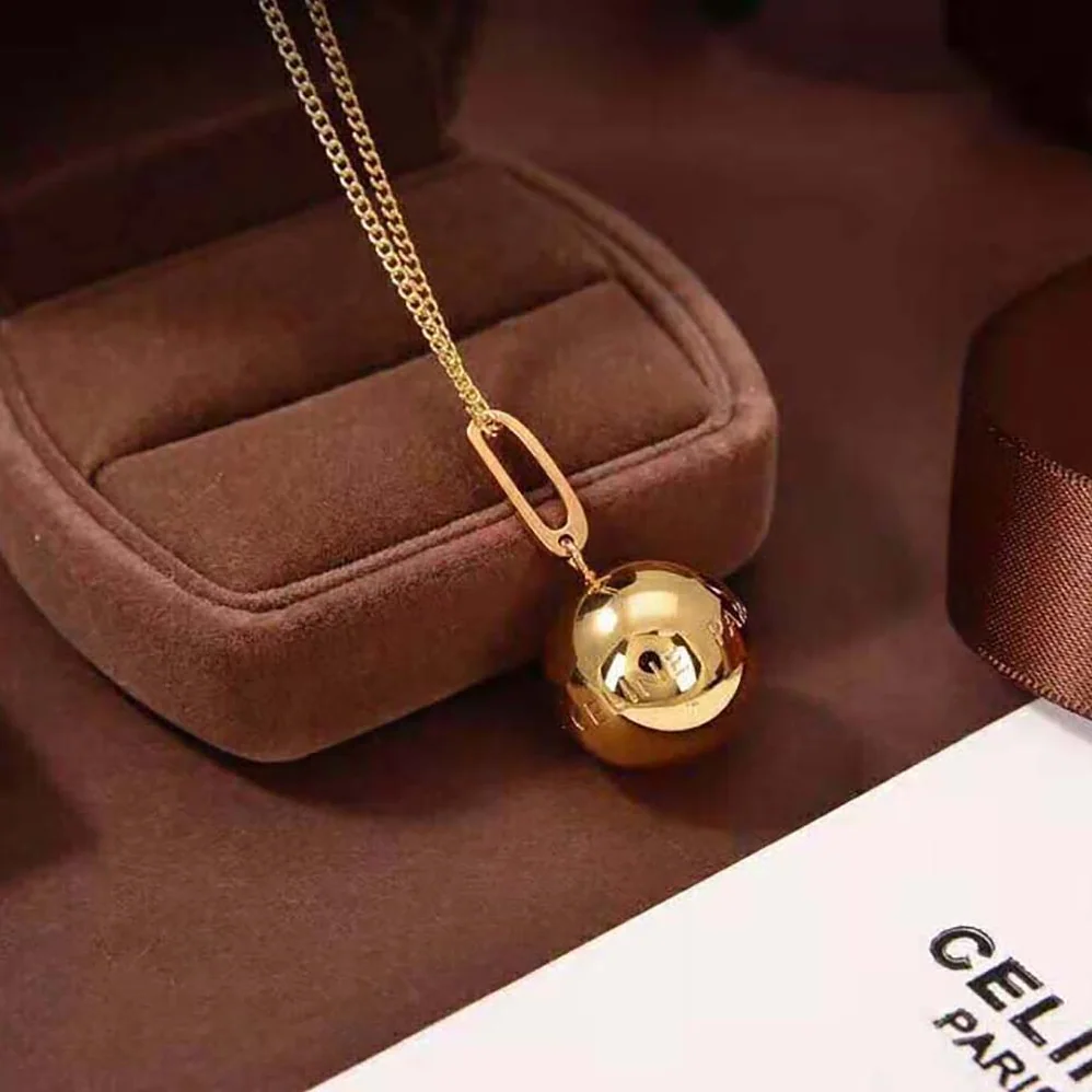 Celine Separables Boule Celine Paris Pendant in Brass with Gold Finish for Women