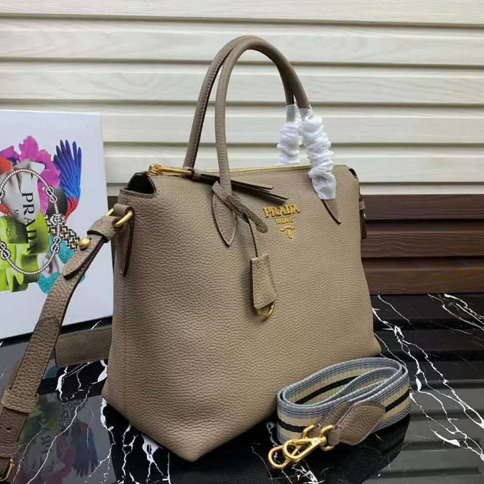 Prada Leather Handbag with Metal lettering Logo on the Front for Women in Beige Prada Leather Handbag with Metal lettering Logo on the Front for Women in Beige