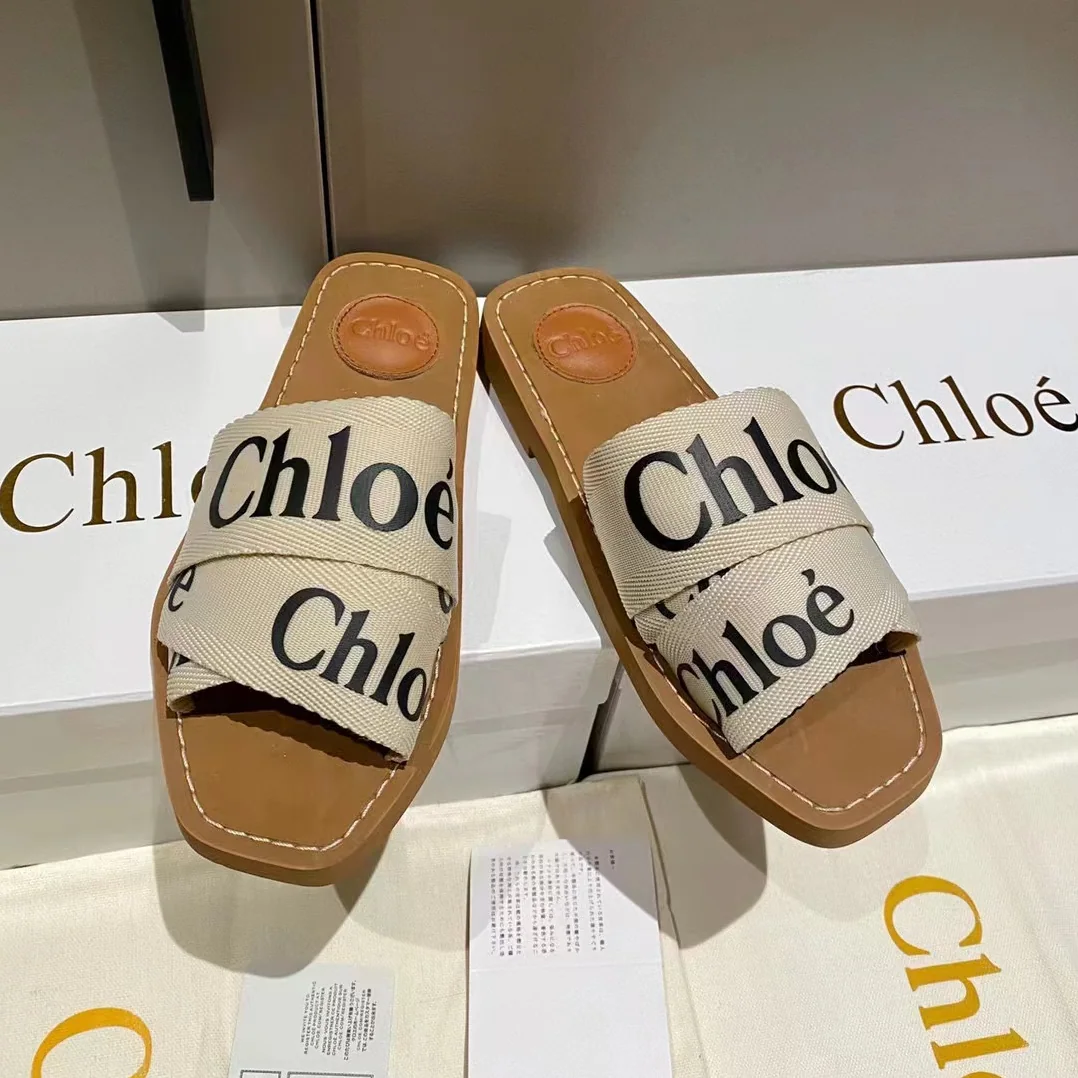 Chloe Woody Flat Mule in Canvas for Women in White