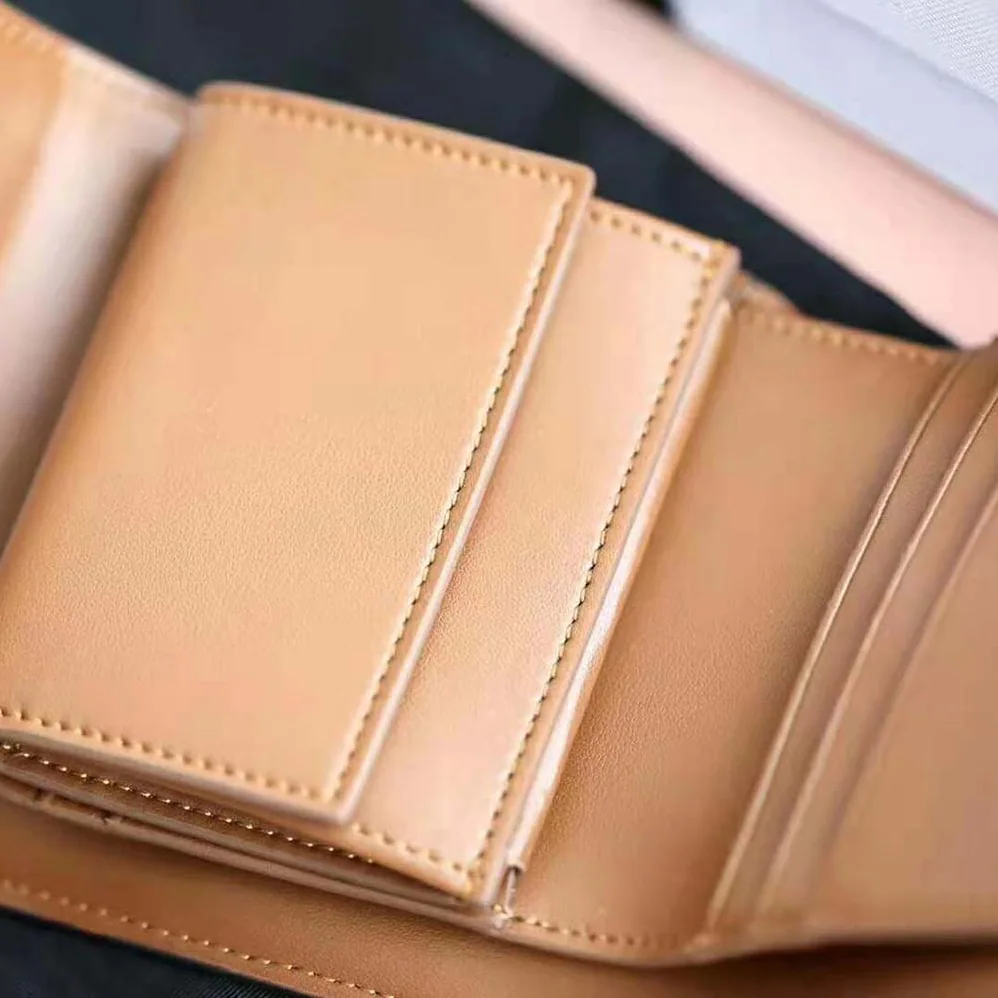 Celine Small Triomphe Wallet in Textile and Calfskin for Women in Brown Celine Small Triomphe Wallet in Textile and Calfskin for Women in Brown