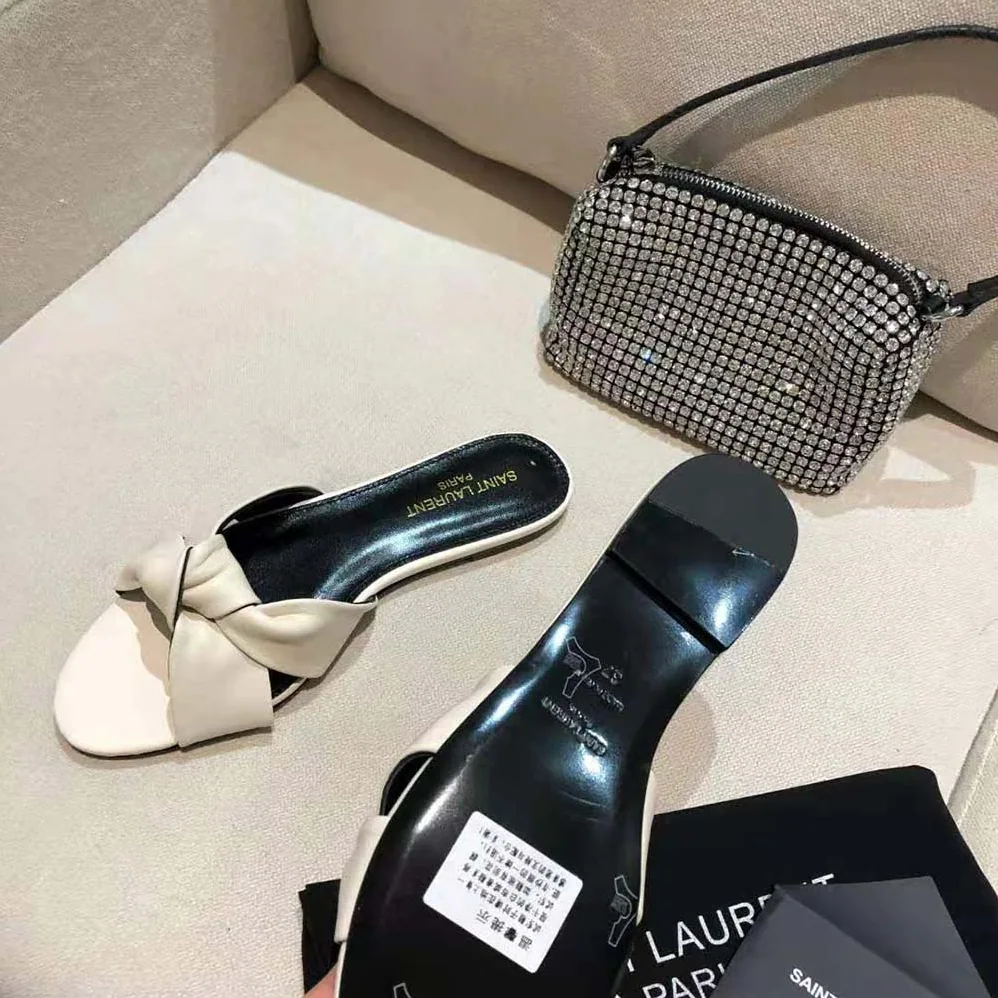 Saint Laurent YSL Bianca Flat Mules in Smooth Leather for Women in White Saint Laurent YSL Bianca Flat Mules in Smooth Leather for Women in White