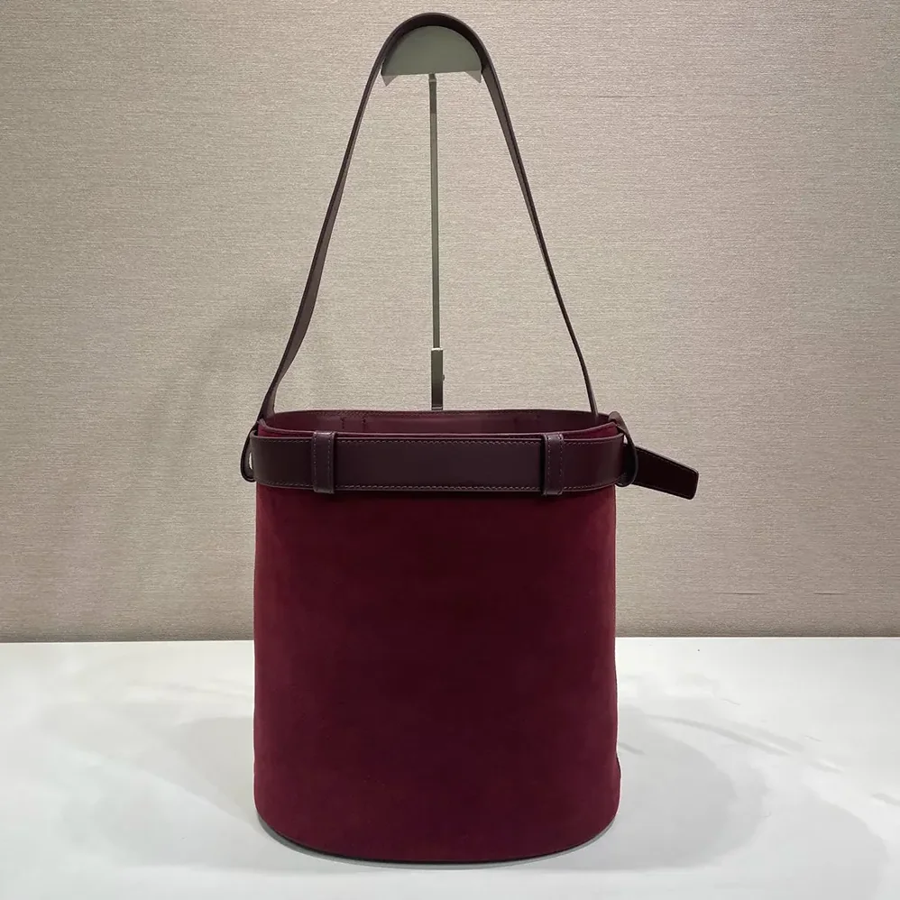 Prada Buckle Belted Suede Bucket Bag for Women in Burgundy Prada Buckle Belted Suede Bucket Bag for Women in Burgundy