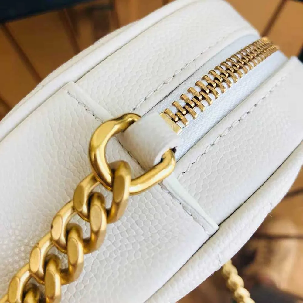 Saint Laurent YSL Vinyle Round Camera Bag in Chevron-Quilted Grain de Poudre Embossed Leather for Women in White