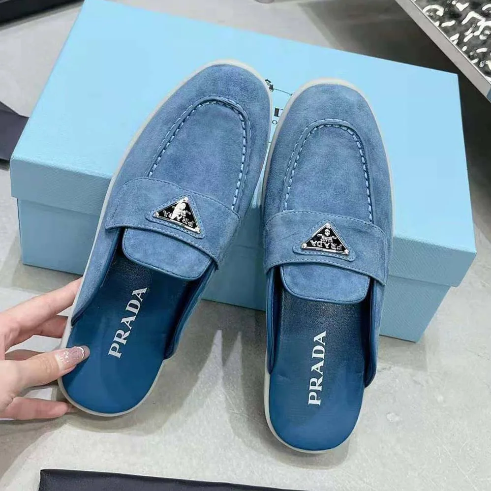 Prada Suede Sabots with the Enameled Metal Triangle Logo for Men