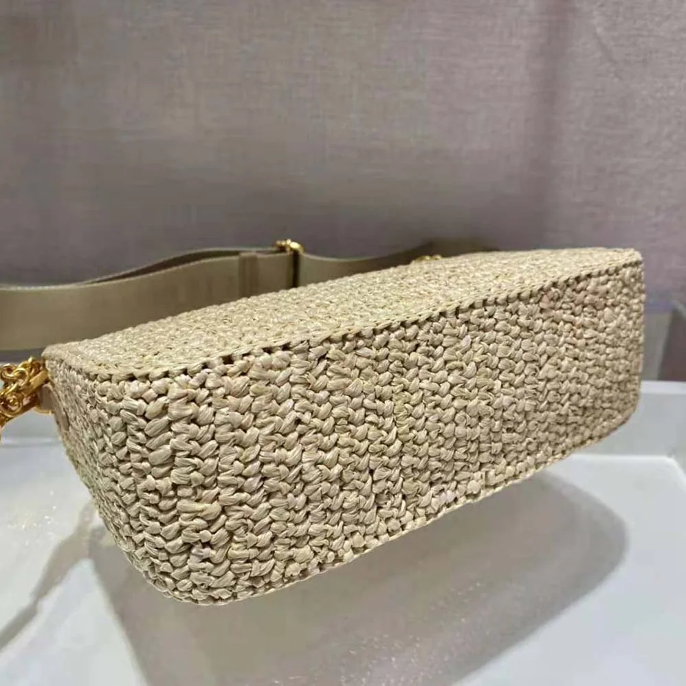 Prada Re-Edition 2005 Raffia Bag for Women in Natural Prada Re-Edition 2005 Raffia Bag for Women in Natural