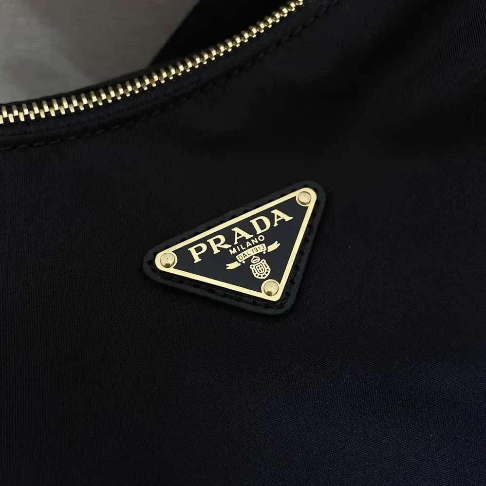 Prada Explore Large Re-Nylon And Leather Bag for Women in Black Prada Explore Large Re-Nylon And Leather Bag for Women in Black