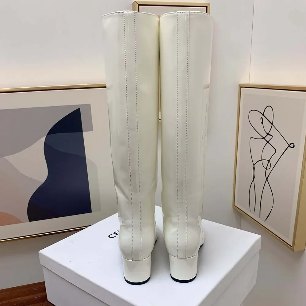 Celine Les Bottes Celine Triomphe High Boot in Patent Calfskin for Women in White