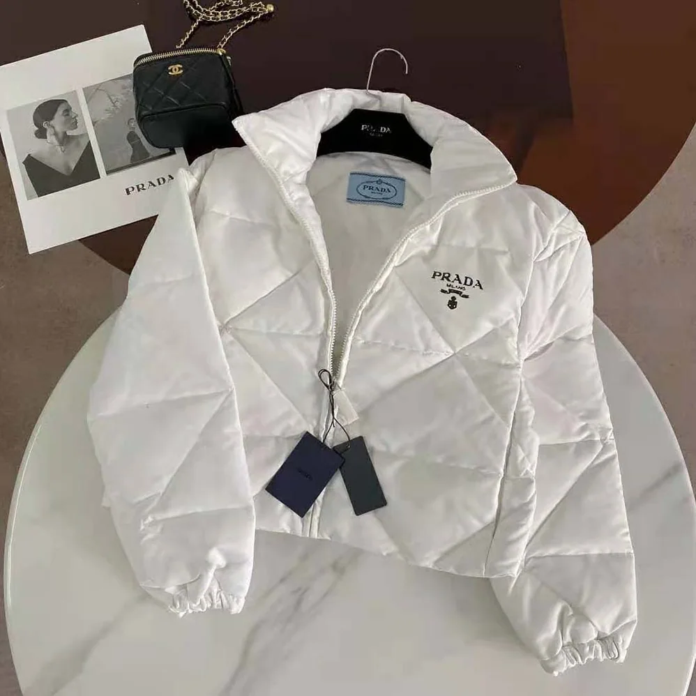 Prada Re-Nylon Gabardine Cropped Down Jacket for Women in White Prada Re-Nylon Gabardine Cropped Down Jacket for Women in White