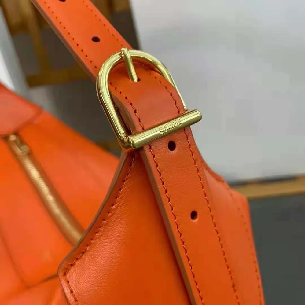 Celine Medium Romy in Supple Calfskin for Women in Orange Celine Medium Romy in Supple Calfskin for Women in Orange